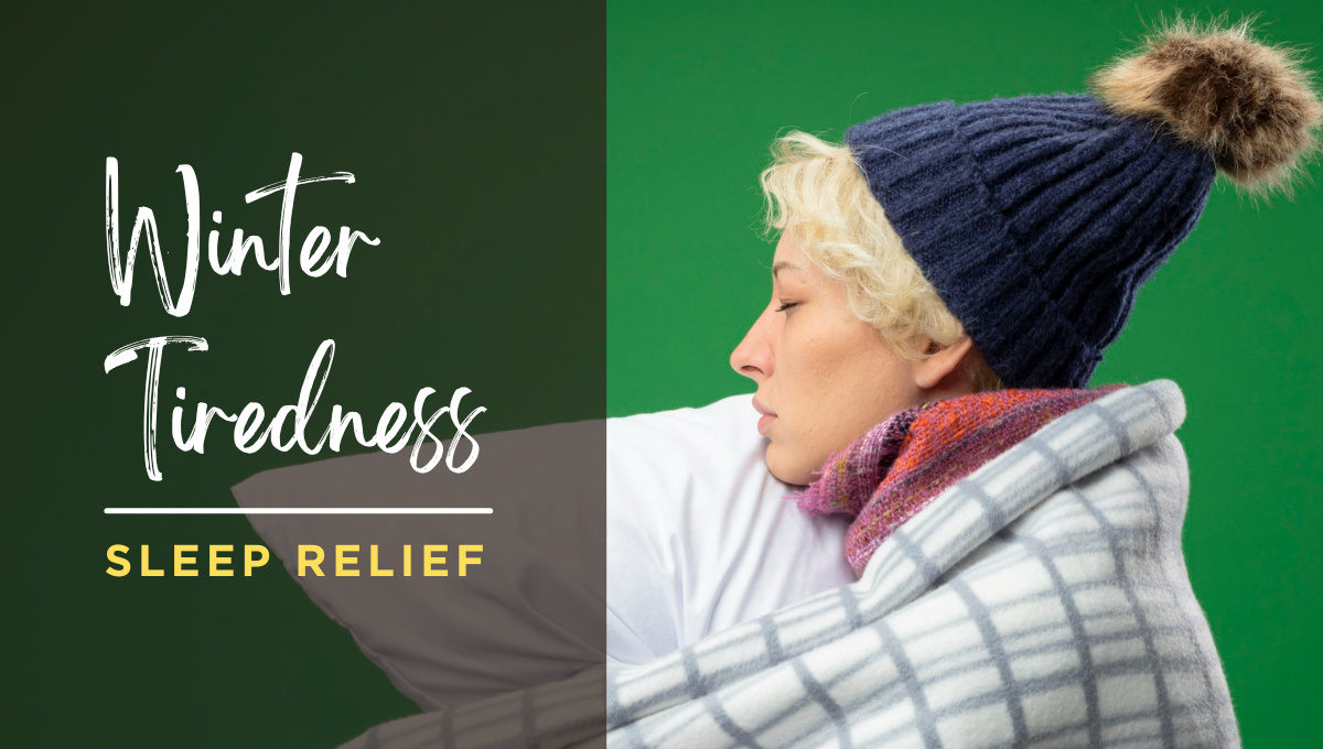 Person bundled in a blanket and winter hat, looking exhausted while holding a pillow, representing winter tiredness and sleep relief.