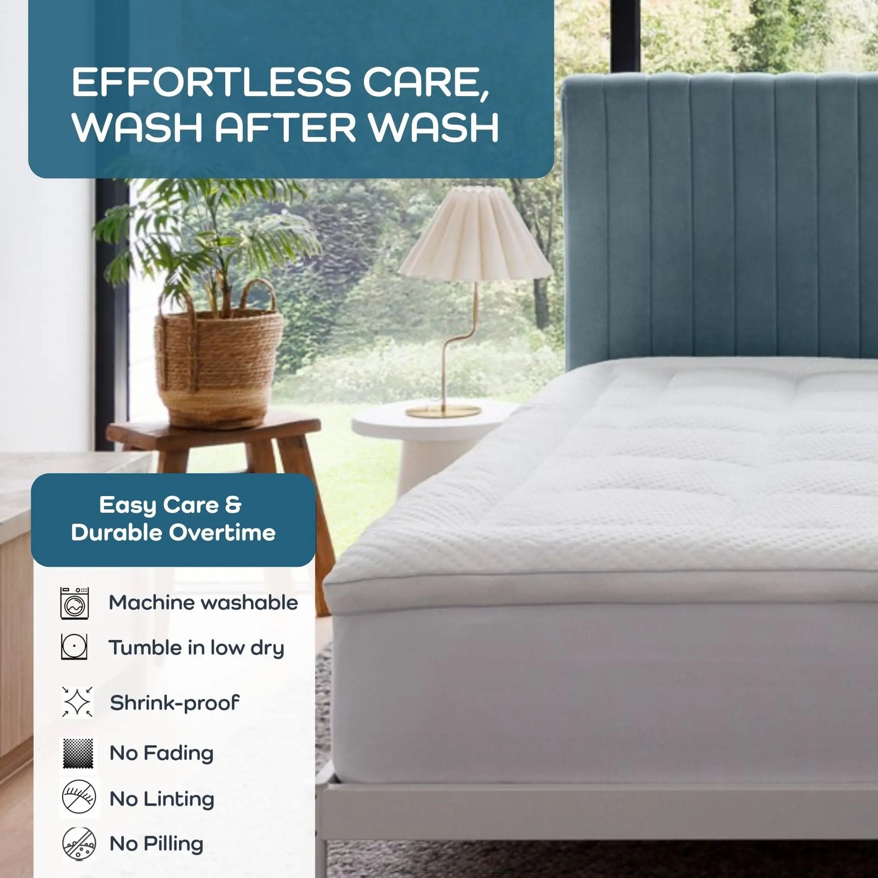 A white mattress topper shown on a bed in a bright bedroom setting with a blue upholstered headboard, window view, plant, and lamp. Text overlays read 'EFFORTLESS CARE, WASH AFTER WASH' and 'Easy Care & Durable Overtime' with bullet points about machine washability, tumble drying, shrink-proof, no fading, no linting, and no pilling.