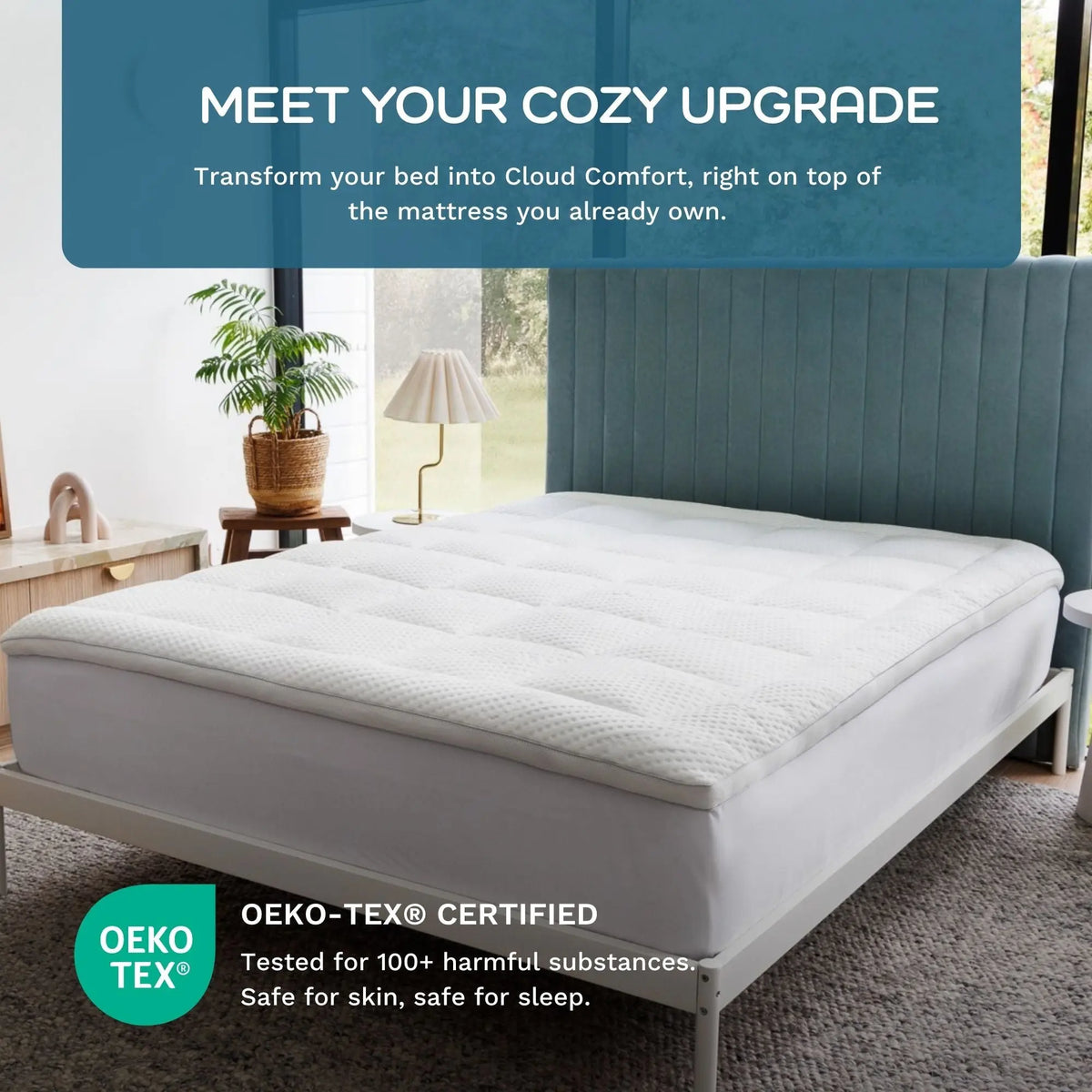 A white tufted mattress topper or mattress upgrade displayed on a bed frame in a styled bedroom setting, with promotional text overlays reading 'MEET YOUR COZY UPGRADE' and an Oeko-TEX certification badge. #color_white