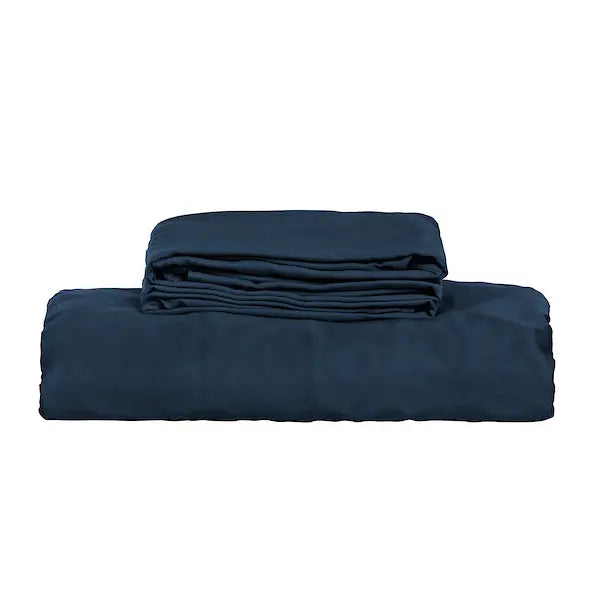 A folded navy blue bedding set, duvet cover set, neatly stacked on a solid white background.