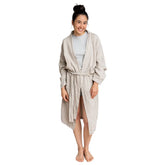 Woman wearing a natural colored robe on a white background #color_natural
