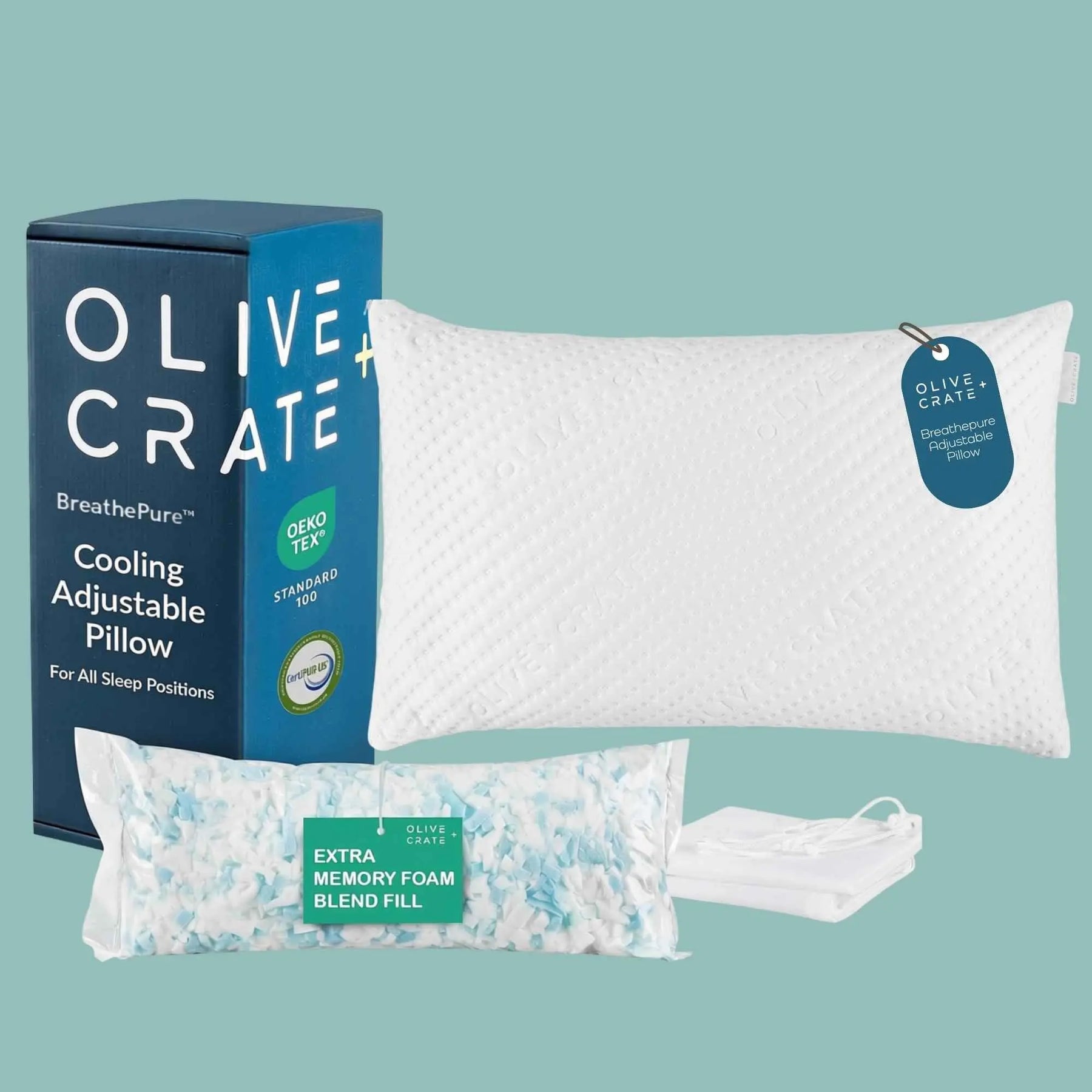 Olive Crate Cooling Adjustable Pillow bundle on a solid teal background, including the blue branded box, a white textured pillow with a blue hangtag, a bag of extra memory foam blend fill, and a folded white pillowcase. 