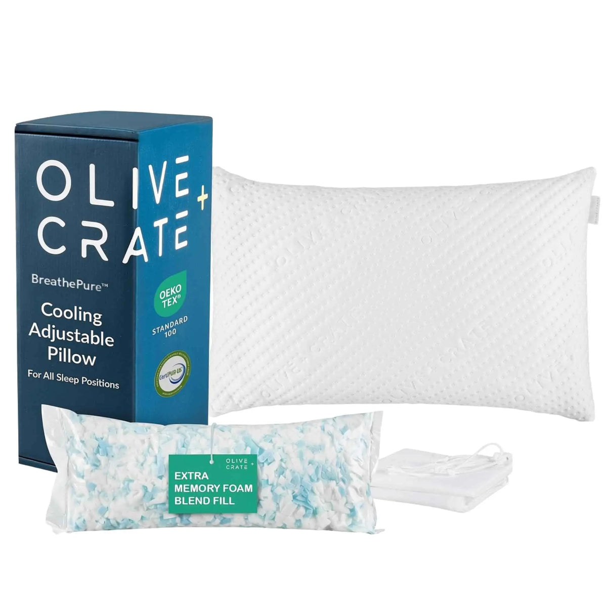 Olive Crate Cooling Adjustable Pillow set including a white textured pillow, blue branded box, packaged extra memory foam blend fill, and a folded white drawstring bag on a white background.Olive and Crate cooling adjustable pillow with packaging on a white background #size_classic